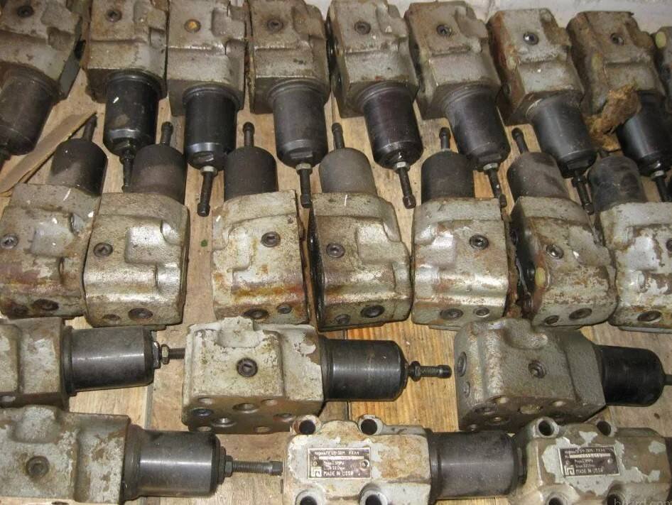 Ремонт и настройка гидравлического насоса CAT